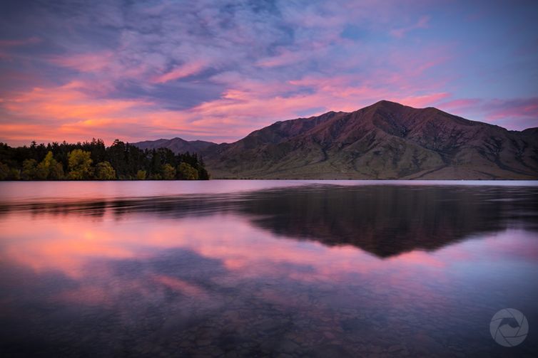 Lake Benmore reflections at sunset landscape, Canterbury, New Zealand