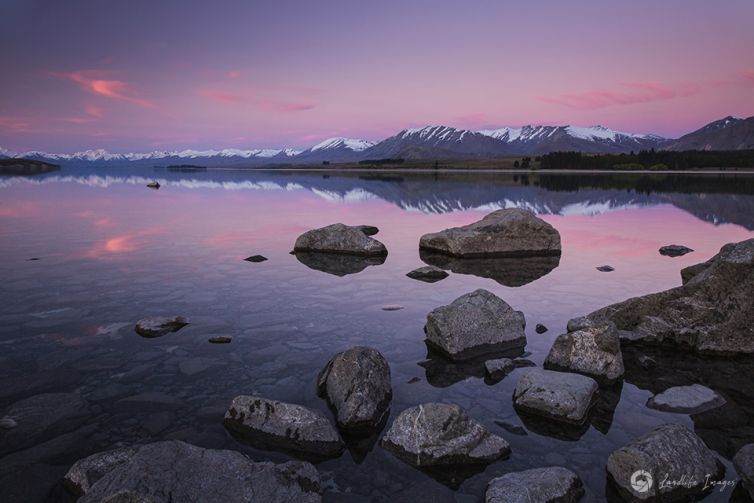 Reflective sunset at Lake Tekapo, New Zealand